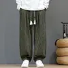 Moda Masculina Nova Estilo Chinês Outono/Inverno 2026 Calças Harem Largas Estampa Xadrez Veludo Tamanho Plus Calças Casuais