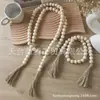 Cuerda de cáñamo color tronco con borla y colgante de cuenta de madera Accesorios para joyería DIY Cuerda de borla con cuentas de madera Colgante de decoración para el hogar Venta al por mayor