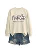 Tendencia de moda personalidad combinable holgado y cómodo suéter de mujer de talla grande color imagen de enfermera practicante