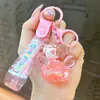 Chaveiro de caneca de chá de leite para gatos com óleo transfronteiriço pingente de areia movediça requintado fofo acessório de bolsa presente atacado de comércio exterior
