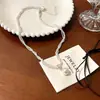 Collar de Perlas Dorado Retro Francés de Doble Capa Enroscado para Mujer 2025 Nuevos Accesorios Lujo Accesible Cadena de Suéter de Gama Alta