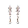 Pendientes de borla con tachuelas de perlas de aguja de plata transfronterizos, pendientes de temperamento suave y elegante, pendientes versátiles de lujo ligero y alta gama para mujer