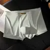 Nuevos calzoncillos tipo bóxer para hombre de seda de hielo, sin costuras, ligeros y lujosos, transpirables y cómodos para el verano, con efecto refrescante