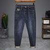 Jeans elásticos bordados para hombre otoño e invierno tiro medio corte ajustado skinny 2022 nuevos pantalones negros y grises moda masculina