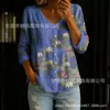 Nueva blusa de mujer de manga larga con botones y cuello en V estampada transfronteriza, elegante y estilosa para ir al trabajo, blusa casual única y a la moda