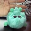 Colgante de cerdas de felpa de imitación venta al por mayor de fábrica estuche para llaves de coche colgante de muñeco de felpa de dibujos animados llavero moderno y genial