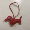 2024 nuevo cuero lindo perro salchicha colgante llavero cachorro colgante bolsa colgante caricatura colgante al por mayor