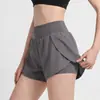 Shorts Esportivos para Corrida Feminino Roupa Externa Anti-exposição Shorts Fitness Falso Duas Peças Solto Cintura Alta Shorts de Yoga Três Quartos