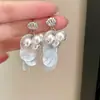 Pendientes Exquisitos y Versátiles Estilo Festivo con Borla de Perla de Concha y Colgantes de Diseño Único