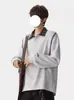 Sudadera con cuello polo de dos piezas falsas para hombre, primavera y otoño, estilo retro americano, retazos, manga larga, camiseta para hombre, holgada, casual, capa base