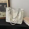 Bolsa popular de estilo coreano para trabalho e dia a dia para mulheres, nova bolsa de ombro versátil e fashion para o verão de 2026, bolsa tote de grande capacidade