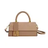 Bolso cuadrado pequeño retro de estilo coreano, moderno y único, para mujer, adecuado para ir al trabajo, con un distintivo toque casual y de alta gama, nuevo modelo cruzado y de mano