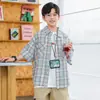 Nueva Camisa de Manga Corta de Algodón Puro Estilo Preppy de Verano 2025 para Niños Camisa a Cuadros de Media Manga para Niños Panda Yuan Yuan