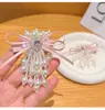 Pinza para el Cabello de Perlas y Borlas con Lazo Rosa Dulce y Linda para Mujer 2025 Nuevo Pinza de Pato