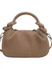 Bolso de mano vertical a rayas texturizado transfronterizo para mujer, nuevo modelo 2025, diseño de nicho, elegante y versátil, de hombro y cruzado, al por mayor
