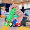 Llavero de coche eléctrico de Mario con dibujos animados, bonito llavero de coche de moda, exquisito bolso de pareja con colgante de muñeca