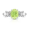 Transmisión en Vivo Más Vendido Anillo Huevo de Paloma Cortado Flor de Hielo de Piedra Preciosa de Color para Mujer Incrustado con Diamante de Alto Carbono Anillo de Mariposa Fabricante Dropshipping