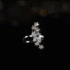Estilo Douyin Mesmo Estilo Micro-incrustado Zircônia Estrela de Cinco Pontas Clipe de Osso da Orelha Design de Nicho Feminino Brilho Leve Simples Brincos de Luz Estelar