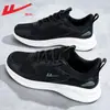 Zapatos de hombre Warrior, zapatos transpirables de primavera, nuevas zapatillas de correr para hombre 2026, versátiles, ligeros, zapatillas deportivas de punto volador con suela blanda para hombre