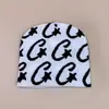 Nova tendência carta rua cruzeiro jacquard malha chapéu homens e mulheres skate quente personalidade boné pullover atacado