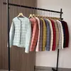 Nueva colección de invierno: chaqueta de plumón simple, versátil, de color sólido, ligera, cálida y delgada. 13608
