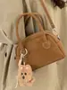 Bolsa de Bolos Portátil para Mujer 2025 Invierno Nueva Moda Retro Bolsa Almohada Viajero de Alto Valor Bolsa Individual