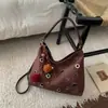 Bolso Tote Commuter con Remaches Transfronterizos para Mujer Otoño 2025 Nuevo Gran Capacidad de Alta Gama Lujo Ligero Un Solo Hombro Bandolera