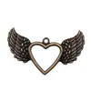 47x 29mm 4.5g comercio exterior AliExpress explosiones calientes colgante de corazón de amor alas de amor huecas