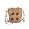 Bolso Tejido Nuevo con Calados Diseño de Nicho Bolso Cubo de Gama Alta Bolso Cruzado de PU Nudo de Molino de Viento Textura Bolso para Teléfono Móvil