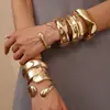 Pulsera Abierta Geométrica Asimétrica Ovalada Metálica Europea y Americana Elegante Exagerada de Nicho Joyería de Mano de Alta Gama para Mujeres
