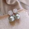 Pendientes de perla de circón 2024, nuevos y modernos pendientes retro elegantes, diseño de nicho, pendientes de lujo ligeros de alta gama para mujer.