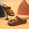 Zapatillas europeas y americanas de comercio exterior nuevas de suela gruesa caladas para mujer de cuña cruzadas de punta abierta para playa