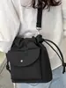 Bolso Casual Pequeño Simple 2026 Nuevo Estilo Bolso Cubo de Lona con Cierre de Cordón de Alto Valor Color Puro Elegante Bolso Cruzado