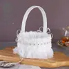 Estilo occidental nuevo cesta de flores pequeña cesta de flores para niña de las flores de boda portátil cesta de flores tejida de plástico cesta de flores para niños de boda al por mayor