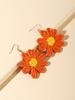 Pendientes bohemios de verano con flores de rafia tejidas a mano para vacaciones en la playa