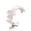Direto da fábrica transfronteiriço moda quente flor aço inoxidável pulseira aberta exagerada oca flor folhas pulseira