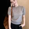 Conjunto de mujer estilo francés: Top de punto gris de manga corta para mujer, nuevo estilo de verano 2026, extremadamente atractivo y juvenil