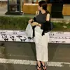 Chic Coreano 2026 Primavera y Otoño Nueva Falda Casual Popular de Moda con Abertura Trasera y Bolsillos Dobles de Longitud Media para Mujer