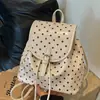 Mochila casual de alta moda de nicho estilo coreano transfronteriza para mujer, nuevo modelo de verano 2026, mochila escolar versátil para estudiantes