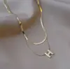 Collar de cadena de hueso de serpiente letra H acero de titanio cadena de clavícula de alta calidad para mujer cadena de suéter que no se decolora accesorios de estilo frío al por mayor