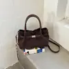 A bolsa versátil popular deste ano 2026 início do outono nova retrô para o trabalho mãe-filho bolsa de ombro única toque de luxo bolsa transversal