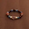 Pulsera bicolor de cristal azul natural y cristal rosa con diseño de oso y rosa, una pulsera blanca de lujo ligero y estilo antiguo fresco.