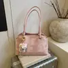 Bolsa de ombro minimalista transfronteiriça para mulheres, nova moda vintage da primavera de 2026, bolsa de alta qualidade para o dia a dia, bolsa tote de grande capacidade