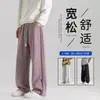 Pantalones de chándal casuales, cómodos, holgados para hombre, talla grande, diseño moderno y a la moda, pantalones rectos versátiles, pantalones largos sencillos y fluidos