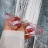 Venta Caliente Transfronteriza Gafas de Moda Europeas y Americanas Gafas de Sol con Figura Europea para Mujer Marco Pequeño Ovaladas de Color Ins Gafas de Sol Ojo de Gato Personalizadas