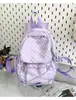 Mochila Minimalista Morada con Puntos y Textura Suave para Estudiantes Universitarios, Versátil para Actividades al Aire Libre