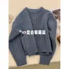 Highly recommended! Super flattering and makes your skin look brighter~ This cherry-red cable-knit sweater is perfect for creating a festive Christmas and New Year atmosphere