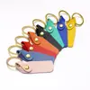 Llavero de piel sintética para hombre y mujer etiqueta de piel de doble cara placa de nombre llavero llavero colgante venta al por mayor logo personalizable