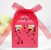 Caja de dulces rosa hueca con láser de amor para San Valentín, caja de dulces de chocolate con cinta de boda, disponible para comercio exterior transfronterizo.