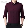 Camisa de Manga Larga para Hombre Nueva de Otoño 2022 Sin Marcas Ajustada Moda Tendencia Color Sólido Camisa Elástica para Hombre Sin Marcas